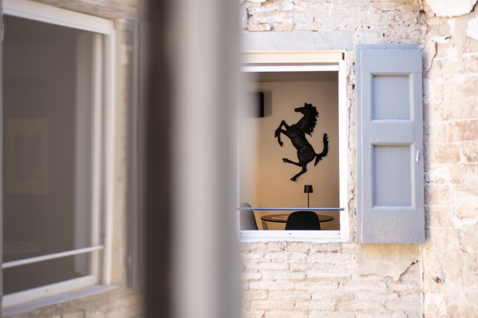 The prancing horse seen from the window onto the inner courtyard