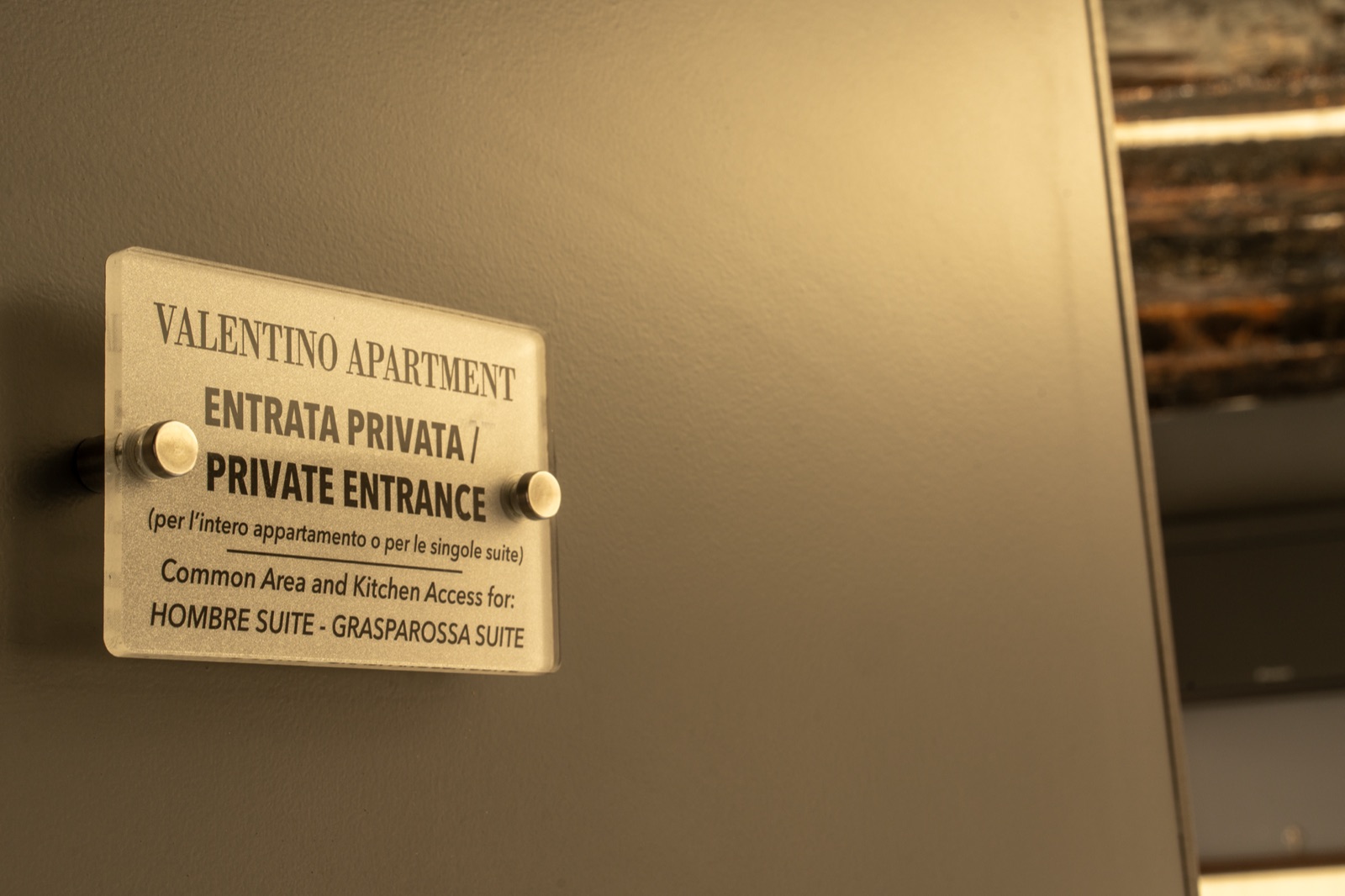 The sign at the private entrance to the Valentino apartment
